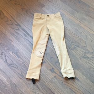 Tan. Size 8. Horse back riding pants.
